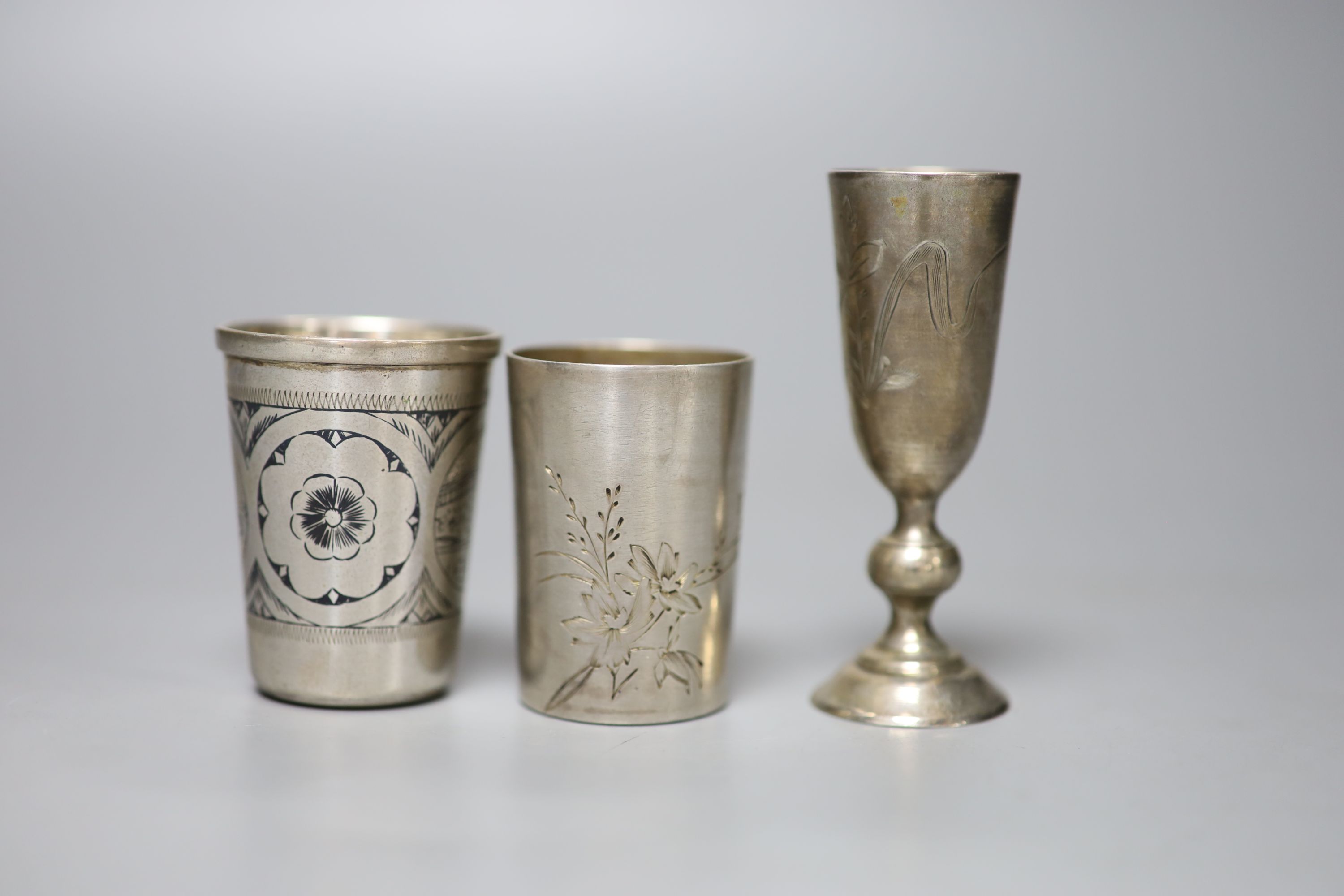 Six assorted early 20th century Russian 84 zolotnik tots, tallest 74mm, a similar enamelled bracelet and a filligree box